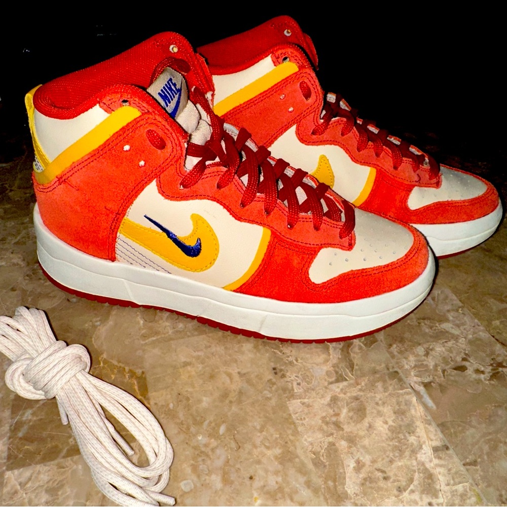 Womans pair of Nikes size 6.5 have two pairs only need one! Wore one time. New!
